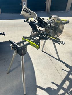 Ryobi 10” miter saw and Ryobi quick stand for saw. Never used!