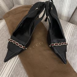 Black Gucci sling back heels