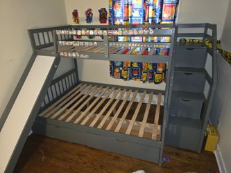 Awesome bunk bed with a twin on the bottom and a single on top . It comes with two storage  drawers on the bottom and three more on the stairs, it als