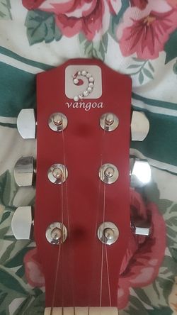 Vangoa acoustic and electric guitar