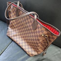 Louis Vuitton embossed tote bag
