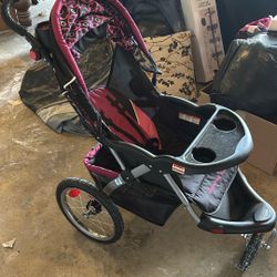 Pink And Black Stroller