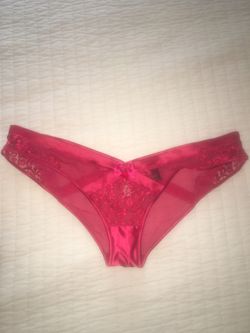 Red Honey Birdette panty Size Large Unused Only washed Absolutely stunning red lace Beautiful red bow with dangling charm Simply super sexy underwear