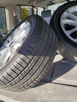 Ford Fusion rims and tires like new