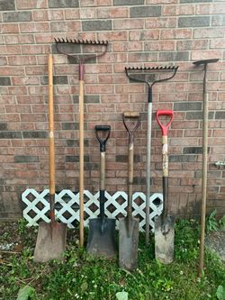 Garden shovels, hoe, and rakes. $6.00 each
