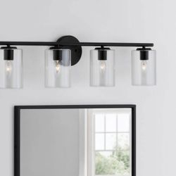 Champlain 31-1/2 in. 4-Light Matte Black Modern Bathroom Vanity Light with Clear Glass Shades
