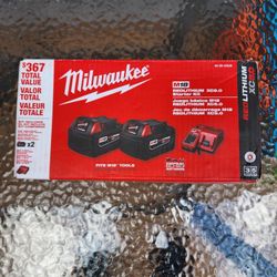 Milwaukee M18 Batteries And Charger 