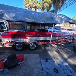 1992 california cool, twenty feet long, shiny red. small block chevy only 500 hrs. on motor