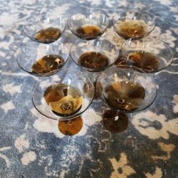 set of amber-colored, hand-blown martini glasses