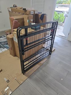 Amazon Basics Twin Foldable Metal Bed Frame – 14" – $50 with or without mattress
