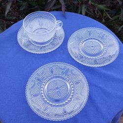 CUP AND 3 SAUCERS WITH A BEAUTIFUL DESIGN 