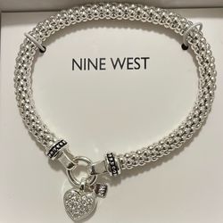  NINE WEST Women's Silvertone Crystal Pave Heart Stretch Bracelet