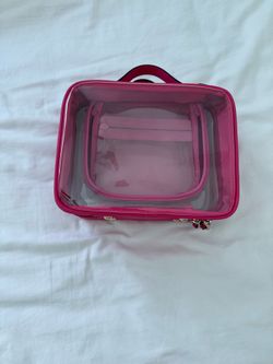 Calpak medium cosmetic case in Dragonfruit