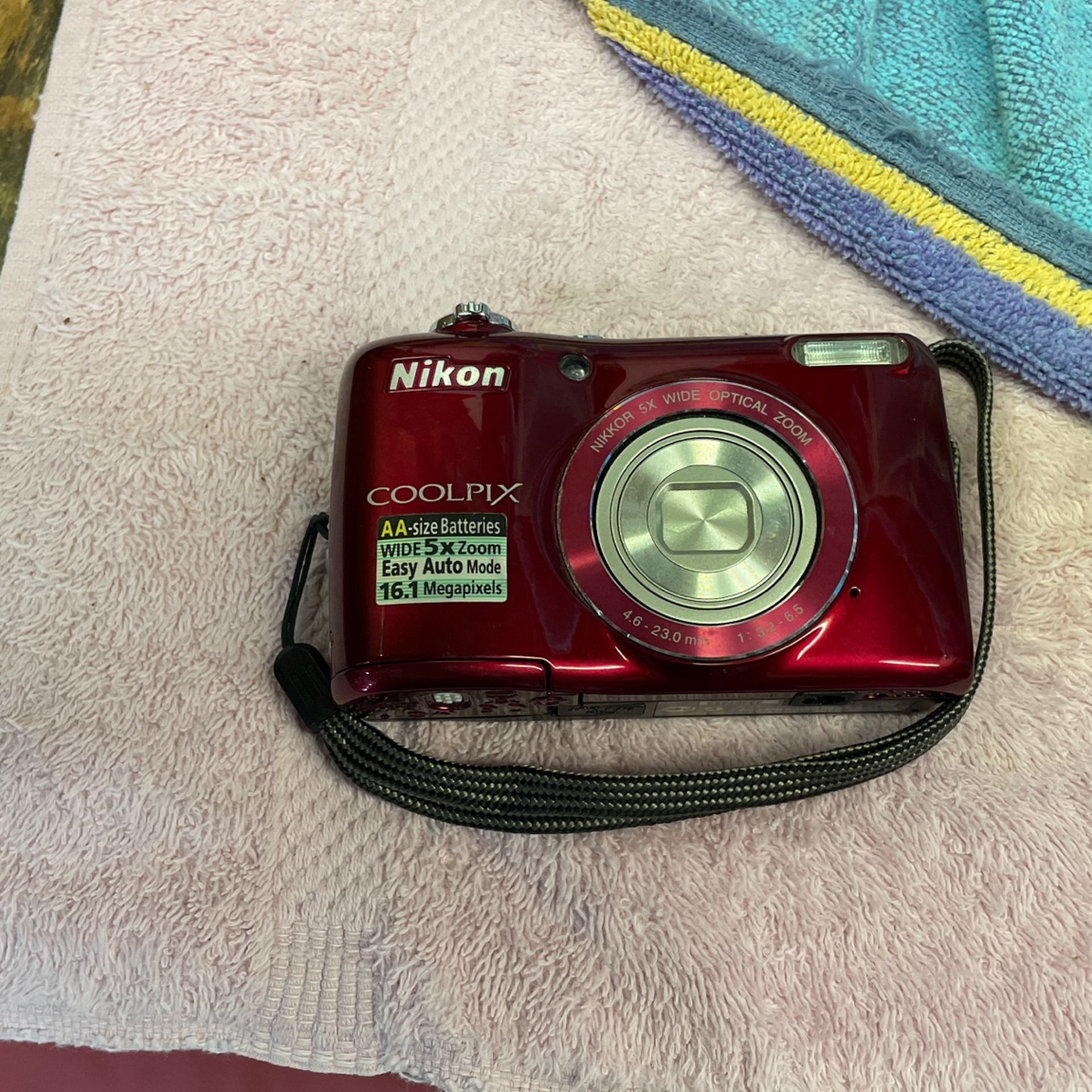 Nikon COOLPIX L26 16.1 MP Digital Camera with 5x Zoom NIKKOR Glass Lens and 3-inch LCD (Red) (OLD MODEL)