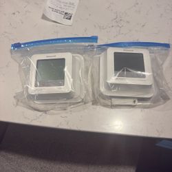 Two Honeywell ProSeries thermostats