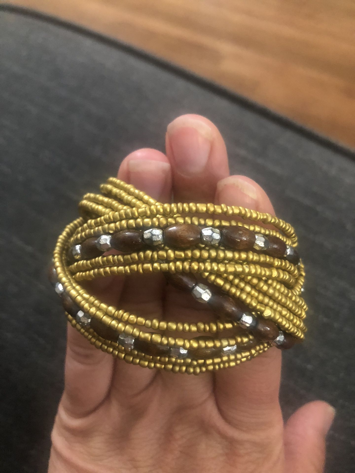 Goldtone Silvertone and brown bracelet