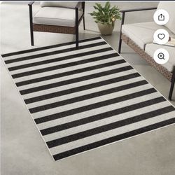 New 5x7 Area Rug  Black And White 2 Available $25 Dollars Each 