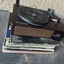 Record Player And Lot Of Random Records 