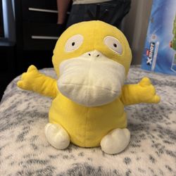 Psyduck plush toy.