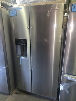 New Whirlpool 36in. Side by side doors with 1 year warranty