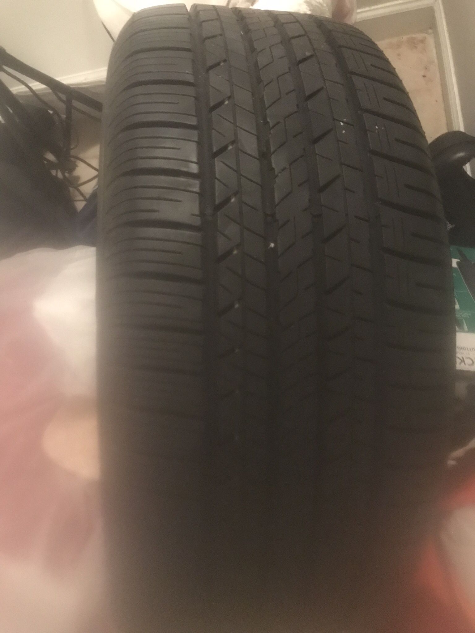 Used Tire Wit 85 Percent Tread Life Left.