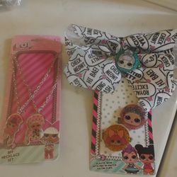 NEW OMG ESSENTIALS, ONE INCLUDES A BOW AND TWO CLIPS, THE OTHER PACK INCLUDES TWO NECKLACES