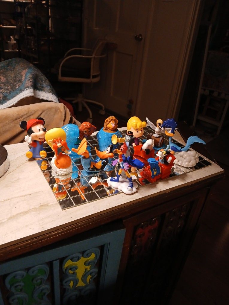 Assorted Disney Collectable Toys.