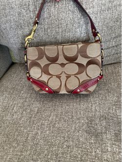 Coach small Carly bag in brown with red