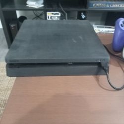 PS4 (1 TB), three Controllers, Wiring, Charging Station, And 58 Games