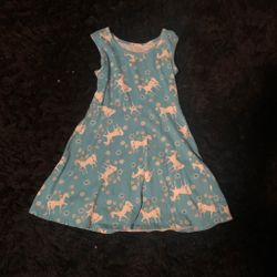 Blue dress with white unicorns and small flowers