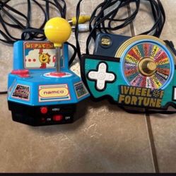 Ms PAC Man/Wheel Of Fortune Plug In Games