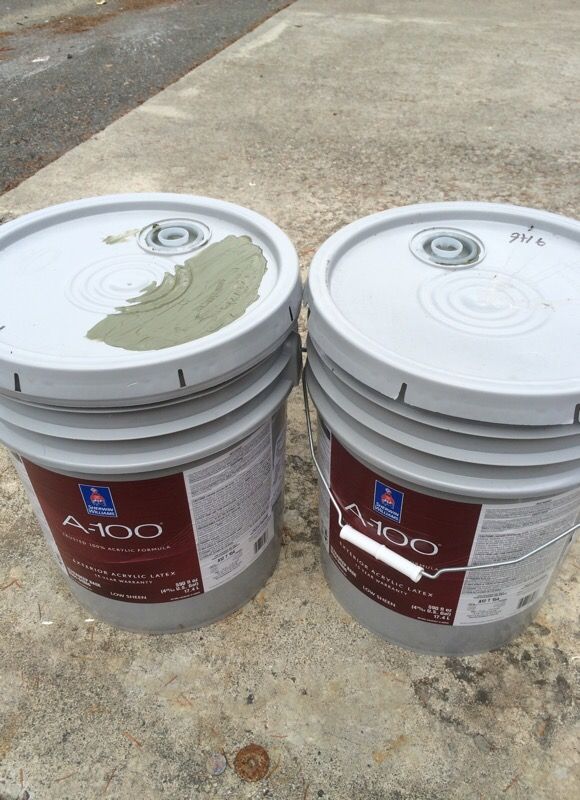 10 gallons of exterior paint brand new. New exterior green