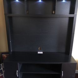 Lighted Entertainment Center with 7 Storage Areas!