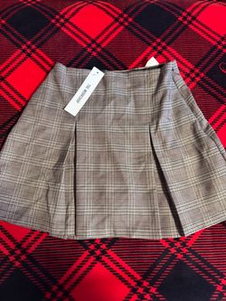 Pleaded brown skirt