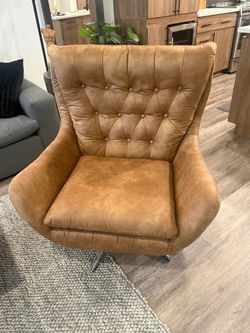 Wingback chair. Leather and suede blend