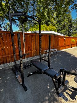Marcy squat rack with plate loaded lat pull down and bench