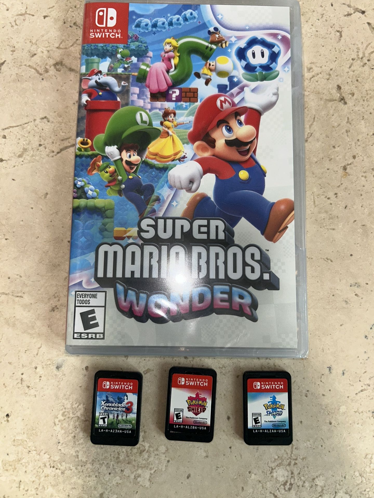 Nintendo Switch Games - Super Mario Bros Wonder, Pokemon Sword & Shield, Xenoblade Chronicles 3