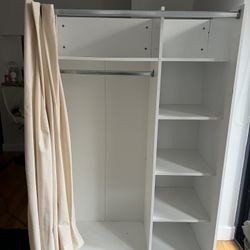 white wooden wardrobe / armoire 
