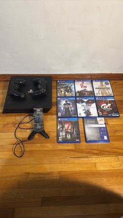 PS4 Pro Console Bundle with 2 Controllers and 8 Games