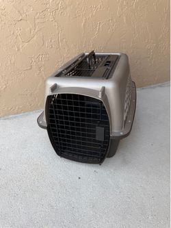 Petmate Two-Door Top-Load Plastic Pet Kennel in a 24-inch size