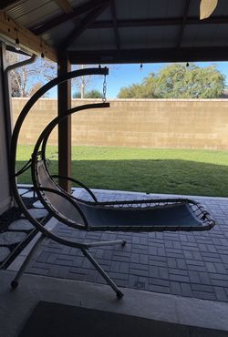 Outdoor Hanging Hammock/Chaise Lounge Chair, solid steel frame. 350 lb weight capacity, in good used condition.