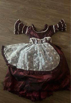deep burgundy/bordeaux Victorian-style or historical-inspired ball gown