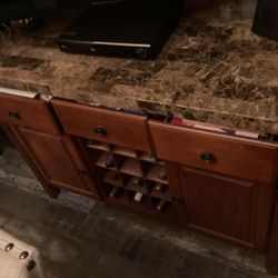 Marble Wine Table With Cabinets, Very Strong very expensive need gone by Friday ASAP please no low Ballers serious buyer don’t waste my time. Tnk you.