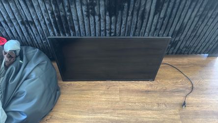 Flat Screen TV with Stand