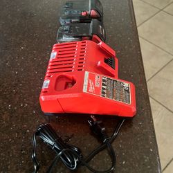 Milwaukee Charger And Batteries 