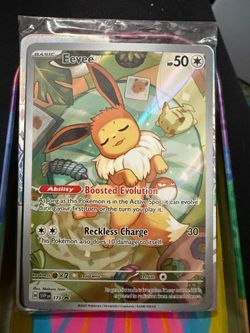 Sealed promo card- Eevee (SVP173) from the Scarlet & Violet—Prismatic