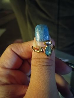 Gold-Tone Ring with Teardrop Blue Stone