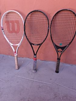 VARIOUS  WILSON TENNIS RACKETS 