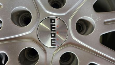 4 Momo Win2 rims with used older Blizzak tires