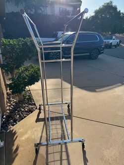 Chrome Rolling Clothing Rack with Bottom Shelf